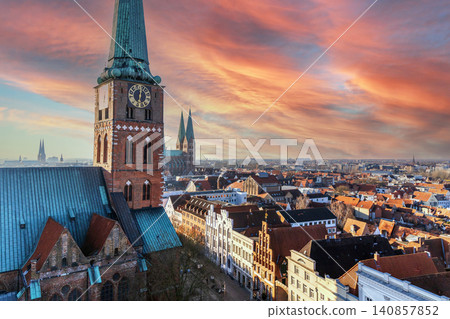 Sunset sky over Lubeck Germany aerial view of historic city Sunset sky over Lubeck Germany aerial view of historic city 140857852