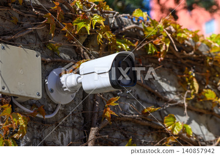 Outdoor Security Camera Mounted on a Wall Outdoor Security Camera Mounted on a Wall 140857942