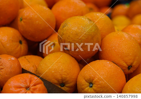 Fresh Oranges Close Up on Display Counter for Background Use 140857998