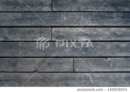 Wooden Floor Texture with Planks Secured by Nails or Screws Wooden Floor Texture with Planks Secured by Nails or Screws 140858054