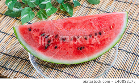 A refreshing dessert featuring sliced watermelon, evoking the image of summer. A refreshing dessert featuring sliced watermelon, evoking the image of summer. 140858173