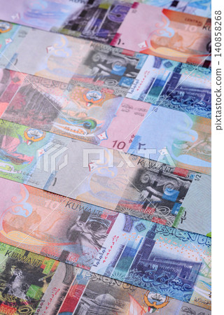 Kuwait paper money, dinar banknotes as currency for exchange or travel. Kuwaiti money Kuwait paper money, dinar banknotes as currency for exchange or travel. Kuwaiti money 140858268