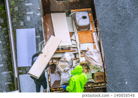 Apartment renovation in Yokohama, Japan. Waste materials are being loaded onto trucks one after another. (Yokohama city) Apartment renovation in Yokohama, Japan. Waste materials are being loaded onto trucks one after another. (Yokohama city) 140858548