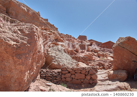 The narrow clay streets reveal the ancient architecture of the Ksar of Ait Benhaddou in southern Morocco. The narrow clay streets reveal the ancient architecture of the Ksar of Ait Benhaddou in southern Morocco. 140860230