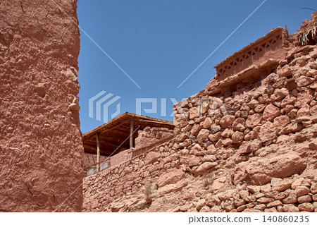 The narrow clay streets reveal the ancient architecture of the Ksar of Ait Benhaddou in southern Morocco. The narrow clay streets reveal the ancient architecture of the Ksar of Ait Benhaddou in southern Morocco. 140860235