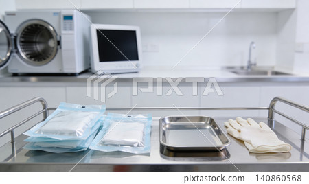 Sterile medical instruments and supplies ready for patient care on a clean trolley Sterile medical instruments and supplies ready for patient care on a clean trolley 140860568