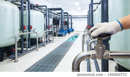 Industrial water treatment plant with hand operating valve and large tanks Industrial water treatment plant with hand operating valve and large tanks 140860755