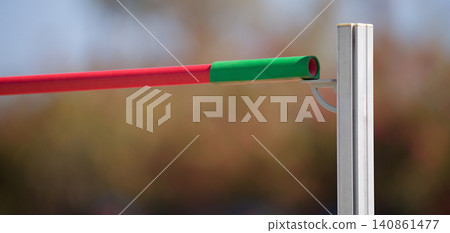 High jump athletics, high jump over bar. Detail bar High jump athletics, high jump over bar. Detail bar 140861477
