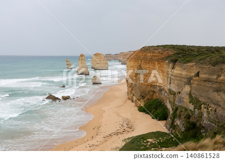 Twelve Apostles Limestone Sea Stacks Along Great Ocean Road Coastline in Overcast Weather Twelve Apostles Limestone Sea Stacks Along Great Ocean Road Coastline in Overcast Weather 140861528
