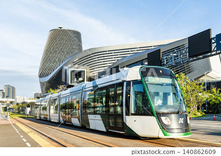 The circular light rail train drives past the Kaohsiung Port Cruise Terminal station in Taiwan. The circular light rail train drives past the Kaohsiung Port Cruise Terminal station in Taiwan. 140862609