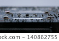 Macro close-up of a graphics card printed circuit board with electronic components, microchips and surface mount devices. Technology, computing and hardware concept 140862755