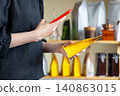 Customer Scanning Coffee Package With Smartphone To Access Product Information Before Purchase In Grocery Store, Mobile Shopping And Digital Consumer Concept 140863015