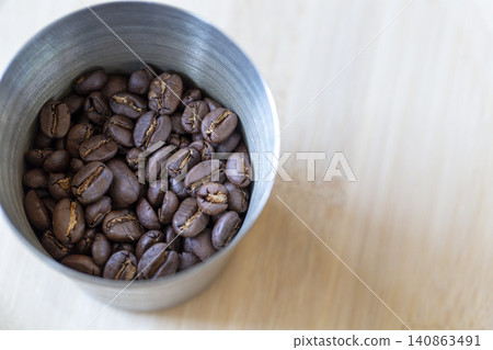 Coffee beans in a cup Coffee beans in a cup 140863491