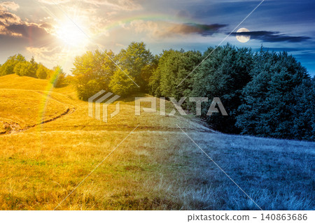 carpathian mountain landscape in summer. day meet night. primeval beech forest on the grassy hill. sun and moon over epic scenery of ukrainian highlands. pristine ecosystem of europe for wallpaper carpathian mountain landscape in summer. day meet night. primeval beech forest on the grassy hill. sun and moon over epic scenery of ukrainian highlands. pristine ecosystem of europe for wallpaper 140863686