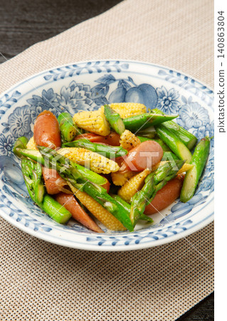 Stir-fried baby corn, asparagus, and sausage Stir-fried baby corn, asparagus, and sausage 140863804
