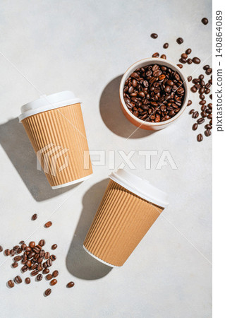 Roasted Coffee Beans and Takeaway Coffee Cups with on Light Background Roasted Coffee Beans and Takeaway Coffee Cups with on Light Background 140864089