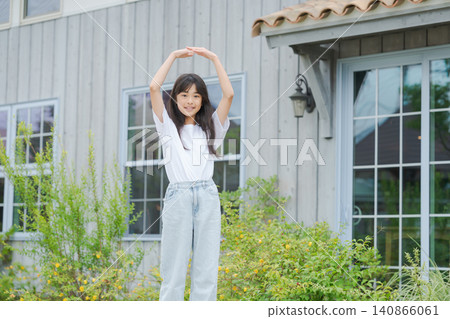 A girl making a big circle A girl making a big circle 140866061