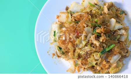 stir fried sukiyaki with egg and pork on white plate stir fried sukiyaki with egg and pork on white plate 140866418