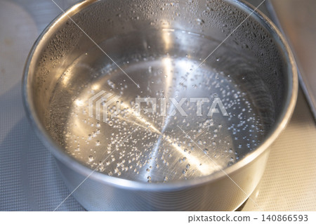 A pot of boiling water A pot of boiling water 140866593