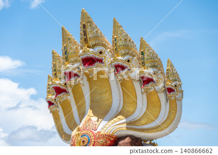 Big seven headed Naga statue situated in Wat Pa Yang Sob Yab temple in Chiang Saen district of Chiang Rai province of Thailand. Big seven headed Naga statue situated in Wat Pa Yang Sob Yab temple in Chiang Saen district of Chiang Rai province of Thailand. 140866662