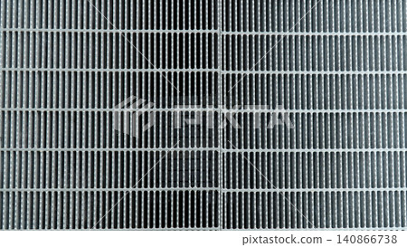 Texture of a grid-patterned steel grating drain cover. Texture of a grid-patterned steel grating drain cover. 140866738