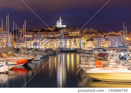 Marseille Old Port marina at blue hour with Notre-Dame de la Garde, France Marseille Old Port marina at blue hour with Notre-Dame de la Garde, France 140866795