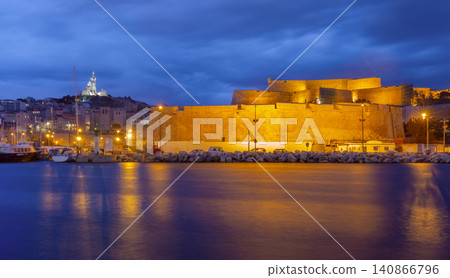 Marseille Old Port marina at blue hour with Notre-Dame de la Garde, France Marseille Old Port marina at blue hour with Notre-Dame de la Garde, France 140866796