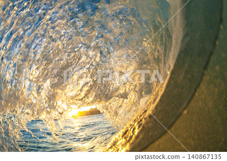 Shonan Kugenuma Beach: Typhoon waves bathed in the colors of the morning sun. Shonan Kugenuma Beach: Typhoon waves bathed in the colors of the morning sun. 140867135