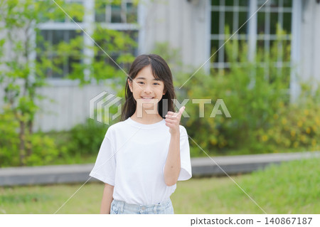 Elementary school student striking a good pose Elementary school student striking a good pose 140867187