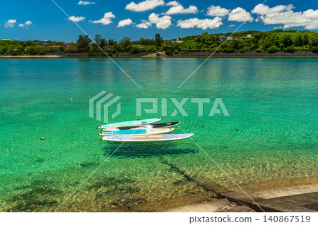 Colorful boats floating on the sea 140867519