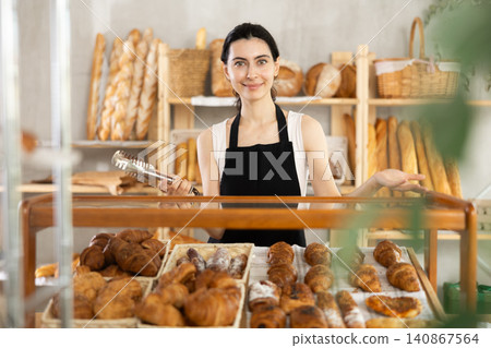 Armenian young woman work selling in family bakery shop Armenian young woman work selling in family bakery shop 140867564