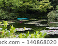 Boats floating on a water lily pond 140868020