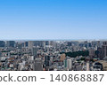 A vast panoramic view of Tokyo stretches endlessly under the blue sky. 140868887