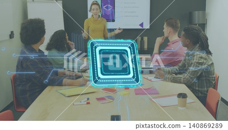 Presenting woman in mustard sweater gesturing at table in meeting room, with holographic padlock 140869289