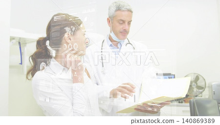 Reviewing chart, physician, lab coat, scope and nurse in white shirt touching chin in clinic, HUD Reviewing chart, physician, lab coat, scope and nurse in white shirt touching chin in clinic, HUD 140869389
