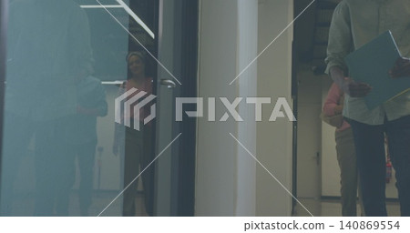 Standing man in light shirt holding blue folder in office corridor, glass reflection, copy space Standing man in light shirt holding blue folder in office corridor, glass reflection, copy space 140869554