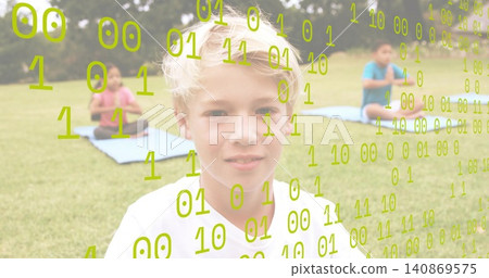 Sitting fair-skinned blonde boy in white t-shirt doing yoga on park lawn, blue mats, binary digits 140869575