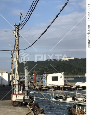 Fishing boat anchored at the fishing port Fishing boat anchored at the fishing port 140869973