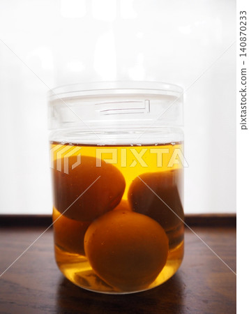 Homemade plum wine placed on the table Homemade plum wine placed on the table 140870233