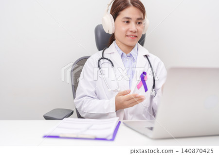 doctor using laptop for telehealth, online consultation and meeting about purple and pink ribbon concept of September Thyroid Cancer Awareness month, Healthcare and February world cancer day doctor using laptop for telehealth, online consultation and meeting about purple and pink ribbon concept of September Thyroid Cancer Awareness month, Healthcare and February world cancer day 140870425