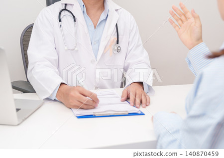 Doctor and patient having a medical consultation for peach ribbon concept of September Uterine Cancer Awareness month, Endometrial, Gynecologic, Uterus and Ovaries, Endometriosis, June Vaginal cancer 140870459