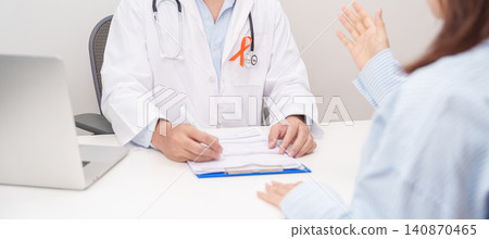 Doctor and patient having consultation with orange ribbon for February World Cancer Day, September Leukemia, March Kidney, August Appendix cancer, Multiple Sclerosis, November CRPS and COPD Doctor and patient having consultation with orange ribbon for February World Cancer Day, September Leukemia, March Kidney, August Appendix cancer, Multiple Sclerosis, November CRPS and COPD 140870465