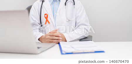 Professional doctor using laptop and writing notes for February World Cancer Day, September Leukemia, March Kidney, August Appendix, Multiple Sclerosis, November CRPS and COPD disease concept Professional doctor using laptop and writing notes for February World Cancer Day, September Leukemia, March Kidney, August Appendix, Multiple Sclerosis, November CRPS and COPD disease concept 140870470