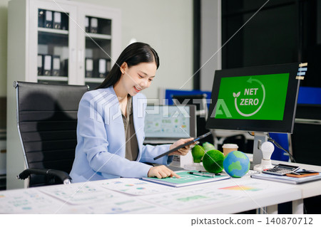 Asian Businesswoman Presenting Net Zero and ESG Sustainability Strategy in Corporate Office Asian Businesswoman Presenting Net Zero and ESG Sustainability Strategy in Corporate Office 140870712