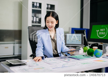 Asian Businesswoman Presenting Net Zero and ESG Sustainability Strategy in Corporate Office Asian Businesswoman Presenting Net Zero and ESG Sustainability Strategy in Corporate Office 140870713