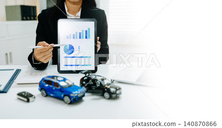 Businesswoman presenting auto insurance sales data and financial analysis on tablet with car models, investment, marketing strategy and dealership concept. Businesswoman presenting auto insurance sales data and financial analysis on tablet with car models, investment, marketing strategy and dealership concept. 140870866