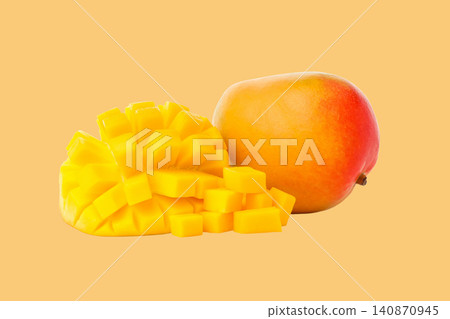 Ripe mango sits alongside diced cubes showcasing its sweet flesh Ripe mango sits alongside diced cubes showcasing its sweet flesh 140870945