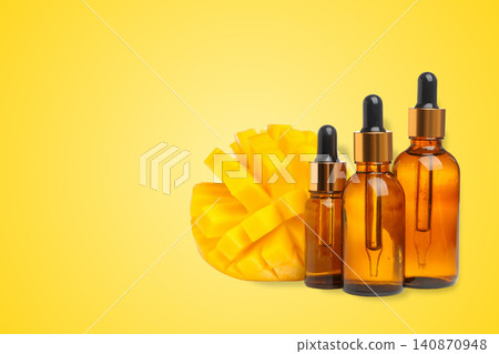 Mango and oil droppers showcase fresh tropical essence 140870948