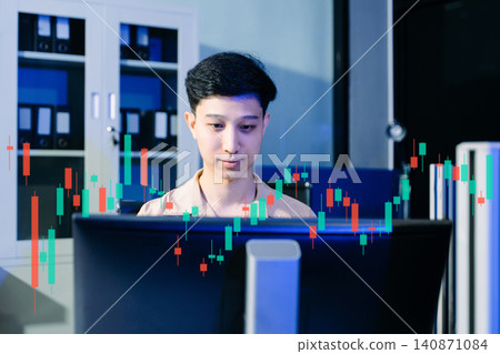 Trader analyzing stock market charts and financial data in a modern workspace, ideal for investment, fintech, trading Trader analyzing stock market charts and financial data in a modern workspace, ideal for investment, fintech, trading 140871084
