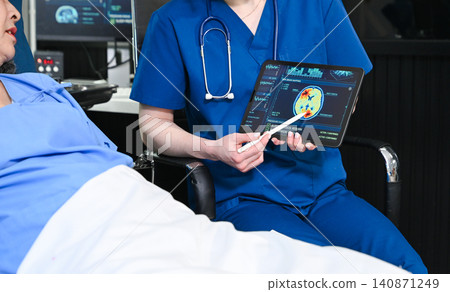 A professional nurse shows an elderly patient their brain scan results on a tablet, representing medical diagnostics, neurology consultation A professional nurse shows an elderly patient their brain scan results on a tablet, representing medical diagnostics, neurology consultation 140871249